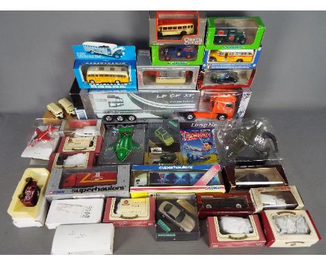 Rextoys, NewRay, Eligor, Oxford Diecast, Vitesse, Corgi, Brumm - An assortment of boxed diecast vehicles in a variety of scal