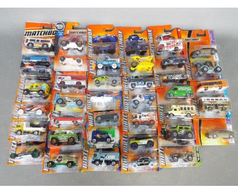 Matchbox - Approximately 40 blister carded modern issue Matchbox diecast vehicles. Lot includes MBX Hawaii Dodge Viper GTS-R;