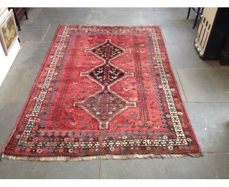 An eastern carpet. 167cm x 244cm