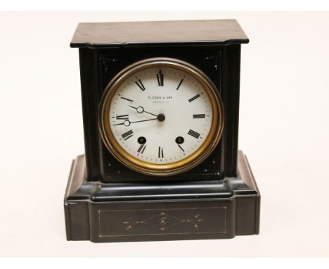 A black slate mantel clock B Cooke Son. H25cm