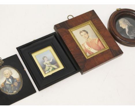 A group of three miniature portraits and a relief portrait