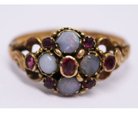 A Victorian yellow metal opal and purple stone ring, gross weight 2.5g, size L
 
Condition good, band a little thin but no da