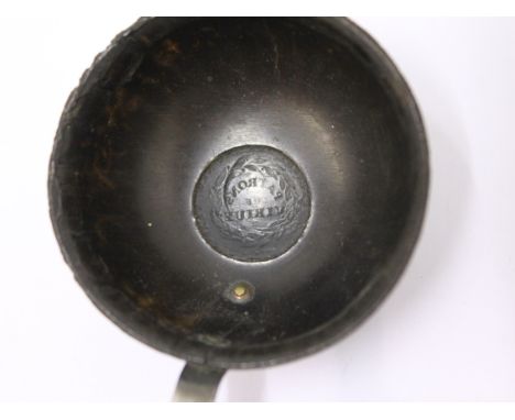 A Georgian ecclesiastical whale bone and silver plated toddy ladle, the inside of the bowl with backwards impressed text 'Par