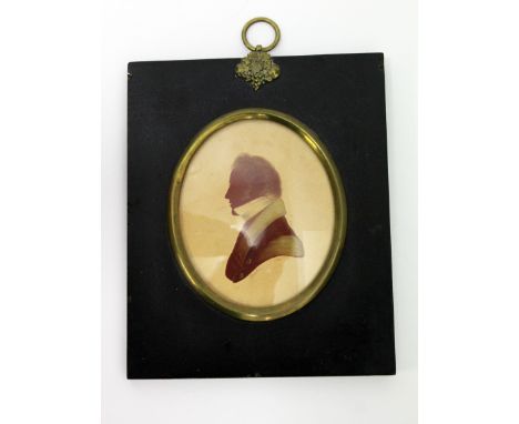 Edward Foster, silhouette portrait of a gentleman, signed and dated 1823, gilt metal oval and black frame, 12cm x 15cm