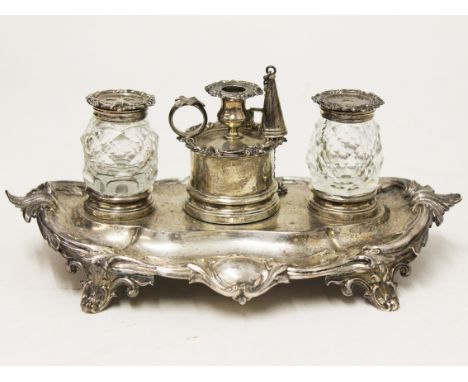 An early Victorian standish having a pair of cut glass bottles and a miniature chamber stick, Edward & John Barnard, London 1