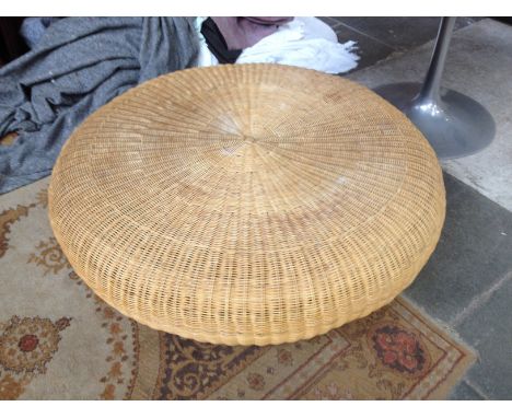 A large wicker pouffe. Diam. 111cm H31cm