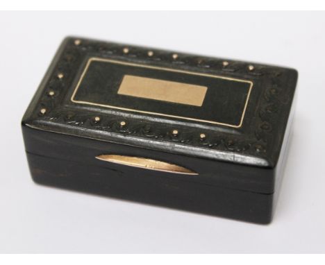 A 19th Century gold inlaid horn snuff box, length 5.3cm