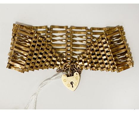 9CT GOLD TEN BAR GATE BRACELET 25.2 GRAMS APPROX