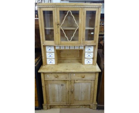An Antique European pine 2-section kitchen dresser, with fitted ceramic drawers, W108cm, H190cm 