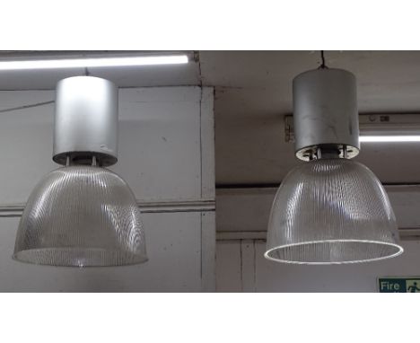 A pair of industrial light fittings 
