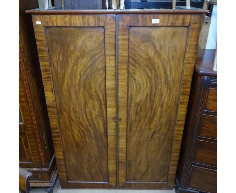 A Victorian flame-veneered mahogany office cabinet, with 2 panelled doors and sliding shelf interior, W95cm 