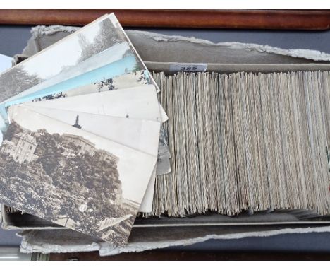 A box with over 700 Vintage British topographical postcards 