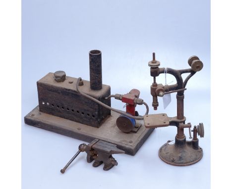 A stationary steam engine, length 10.5", a watchmaker's vice, and another tool 