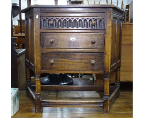 1920s oak console table, of canted form, with 3 short drawers, W55cm 