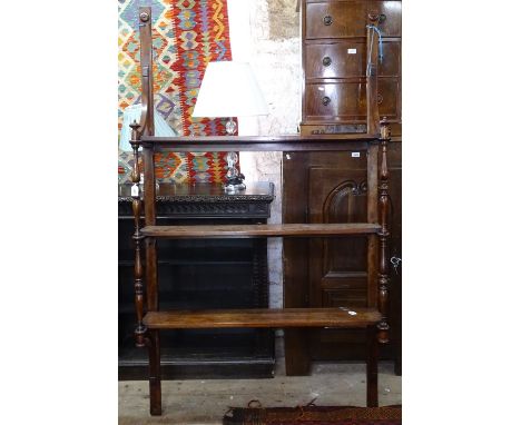 A 19th century mahogany wall hanging 3-tier open display shelf, with spindled columns, width 3' 7", height 6' 4" 