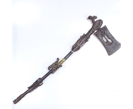 A brass axe decorated with various animals, 21.5" long 