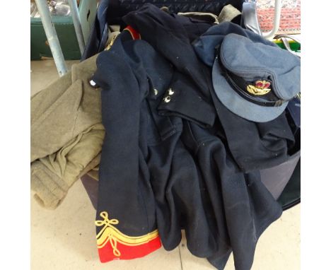 A suitcase with an Army Greatcoat, a Regimental tunic, caps etc 