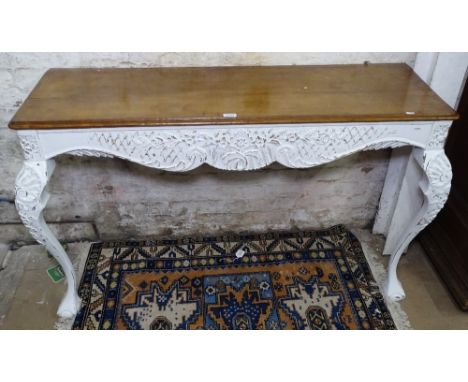 A walnut and painted console table on cabriole legs, W134cm 