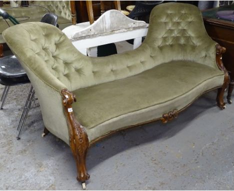 A Victorian button-back upholstered and carved walnut-framed double spoon-back settee 