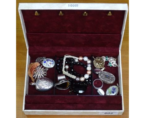 A miniature scent bottle, enamel lockets, small silver pill box, and costume jewellery 