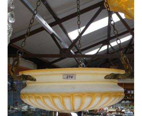 An Art Deco peach and milk glass ceiling light bowl, with original brass fittings, diameter 13.5" approx 