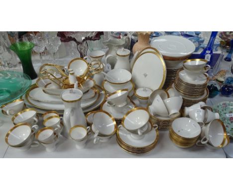 Extensive Rosenthal porcelain dinner service, with gold patterned borders, and matching tea and coffeeware 