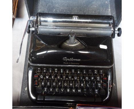 A Vintage Optima portable typewriter with case 