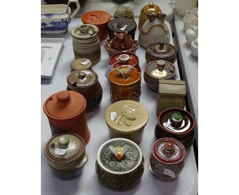 A collection of Vintage honey pots 