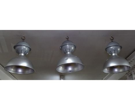 A set of 3 industrial metal light fittings. 