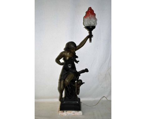 A large early 20th century patinated spelter Table Lamp of figural form with a seated classical woman holding aloft a flaming