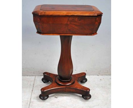 An early 19th century possibly Regency Mahogany Teapoy, canted rectangular caddy cabinet with hinged lid enclosing a blue fab
