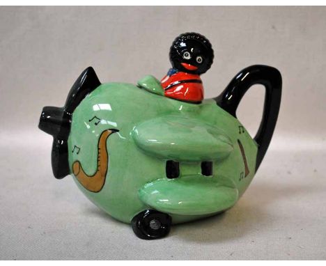 A rare Carlton ware Novelty Teapot, in the form of an Aeroplane being flown by a Black Boy, jade green trial colour 16.5cm hi