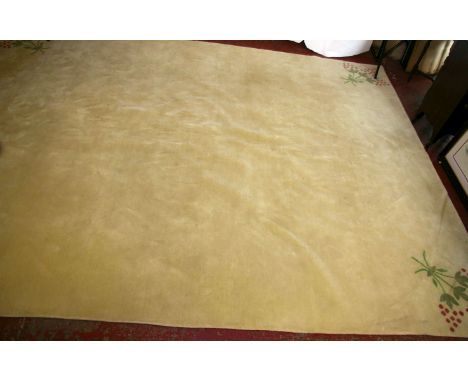 A modern ivory ground carpet with stylized decoration 270 x 370cm 