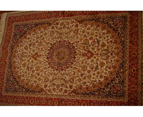 A beige ground Kashan carpet 230 x 160cm 