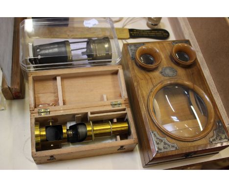 A Victorian stereoscopic walnut viewer, cased set of scales, field microscope, compass, exposure meter and pocket viewers 