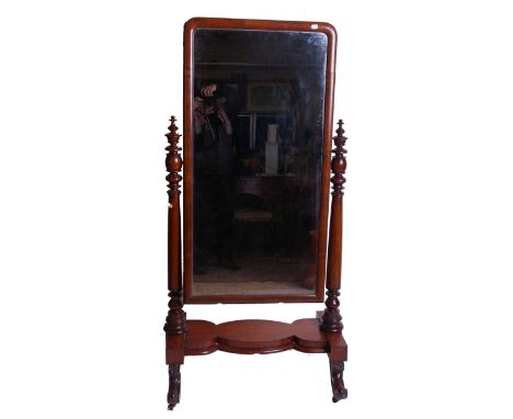 A Victorian mahogany cheval mirror with turned supports and a shaped wide stretcher shelf, w: 76cm, h: 156cm