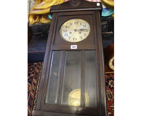 An oak wall clock with 2 train movement with pendulum and key together with a president arch top mantel clock 