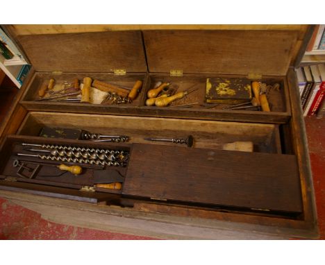 Tools a Victorian fitted carpenters trunk in painted pine, three layers of trays with tools including saws, drill bits, some 