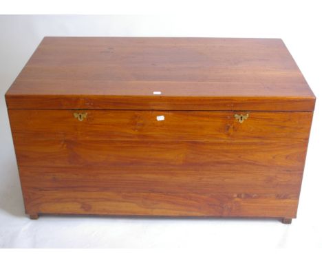 A large teak trunk, 57cm high, 107cm wide, 60cm deep 