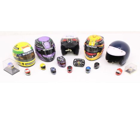 Motorsport: A collection of five assorted scale replica race helmets, including one signed by Jackie Stewart, together with t