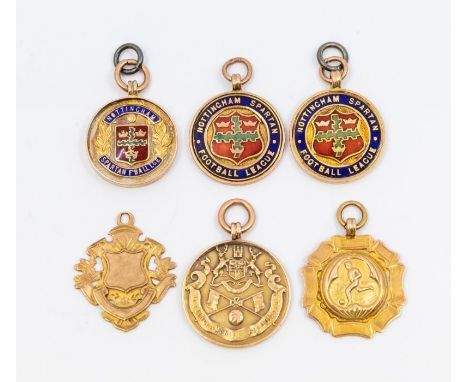 Football: A collection of six 9ct gold hallmarked and enameled medallions and fobs, five having football interest, comprising