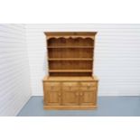 2 Piece Pine Dresser. 3 Shelves in Top Cabinet. 3 Drawers and 3 Doors in Bottom Cabinet.