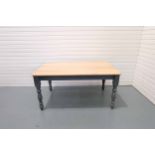 Solid Wood Farmhouse Style Dining Table With Wooden Top and Painted Grey Legs.