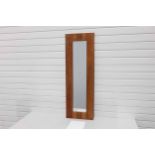 Wood Framed Mirror With Carved Detail.