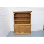 2 Piece Pine Dresser. 2 Shelves in Top Cabinet. 3 Drawers and 3 Doors in Bottom Cabinet.