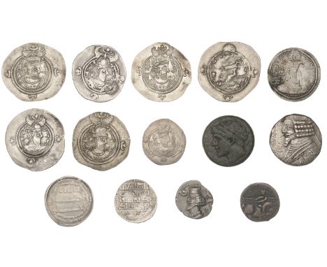 Assorted Ancient and Islamic coins, in silver (12), base metal (2) [14]. Varied state, one plugged £100-£150