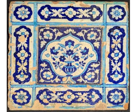A fine large 18th century Mughal multan tile depicting floral decoration, 38cm x 38cm x 3cm