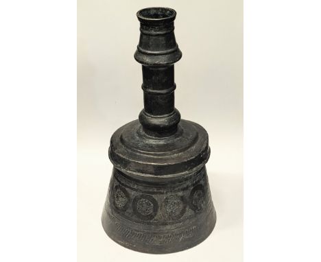 A rare large 17th century Ottoman Turkish engraved copper candlestick, H.42cm