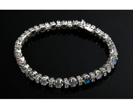 Weißgold 750 Armband mit runden Opal Tripletten (Ø 4,1mm) und Brillanten (zus. ca.  1.38ct/SI/W), 17,5g, L. 17,8cm, mehrere O