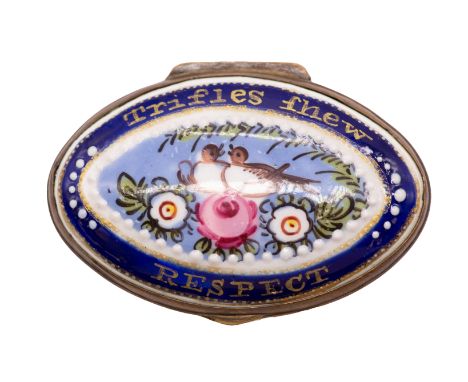 An 18th Century Bilston enamel navette shaped gilt metal mounted patch box and cover, powder blue ground body, the cover pain